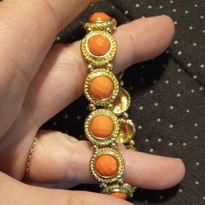 Elegant Gold and Orange Bracelet